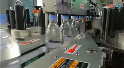 Mineral water round bottle labeling video